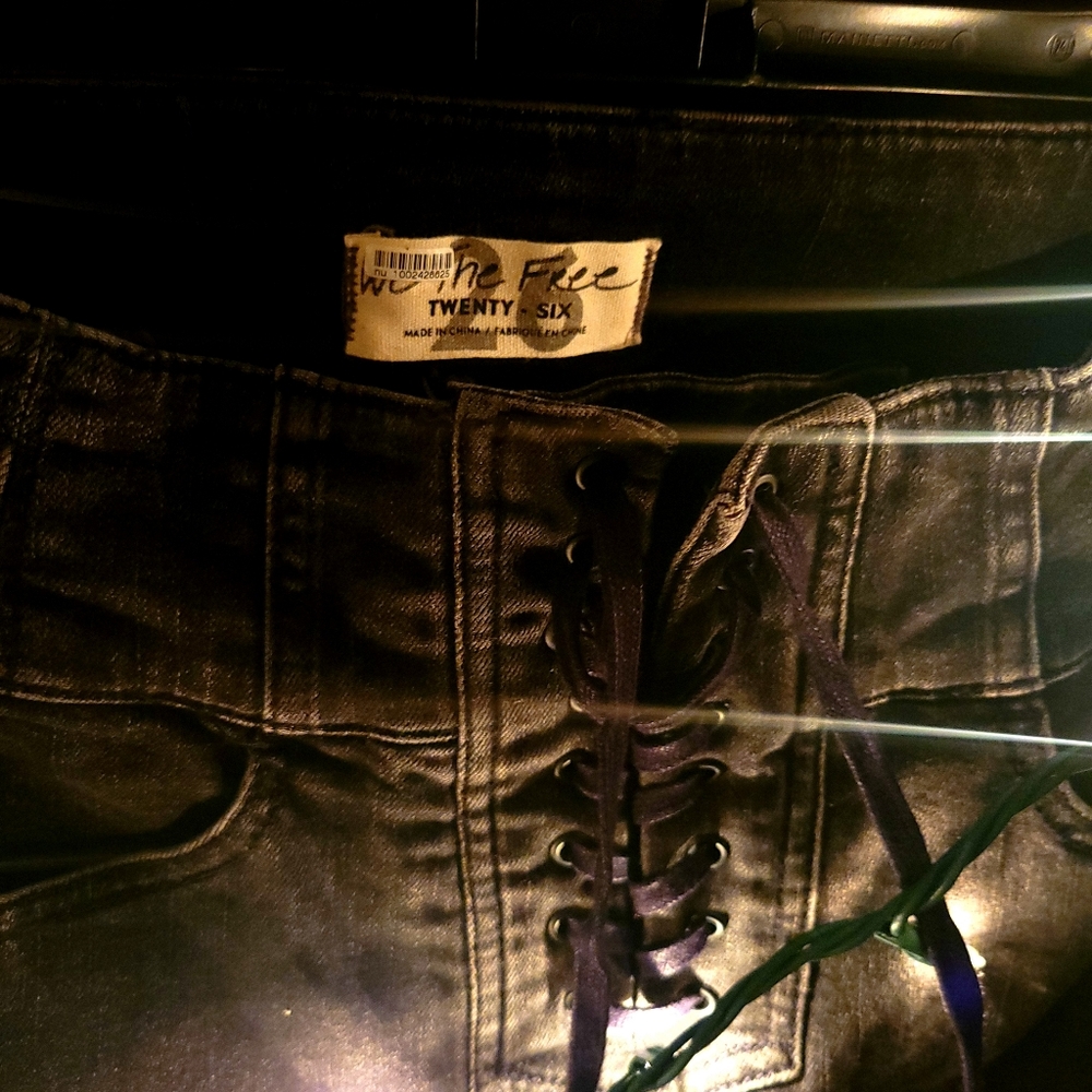 WE THE FREE black faded skinny lace-up jeans